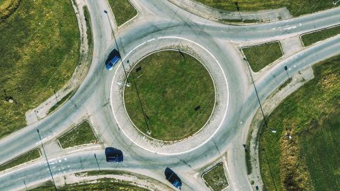 Aerial View Of Traffic Circle Roundabout Road Junction, Top View