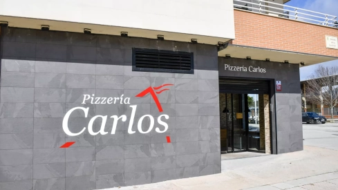 La cadena de restaurantes 'Pizzería Carlos' llega a Ponferrada abriendo boca al barrio de La Rosaleda