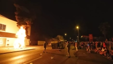 Disturbios durante la madrugada de los trabajadores de LM con los antidisturbios