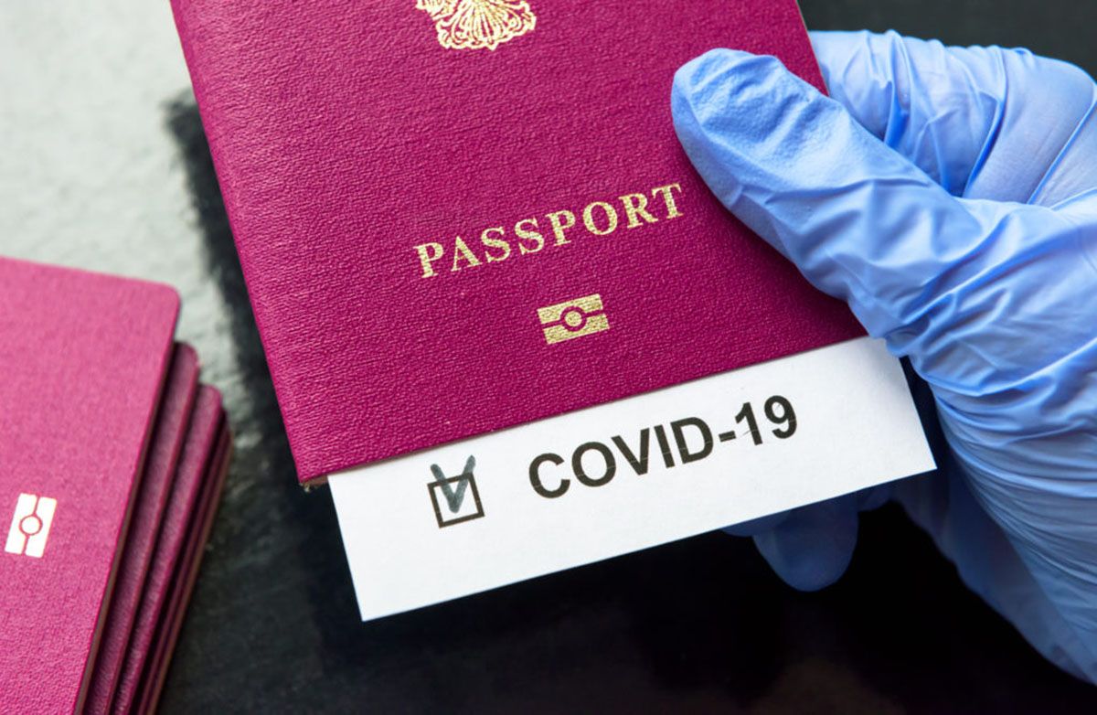 COVID-19 coronavirus pandemic and travel concept, COVID-19 note in passport. Novel corona virus outbreak, spread of epidemic from China.