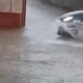 Calle principal de Fabero inundada