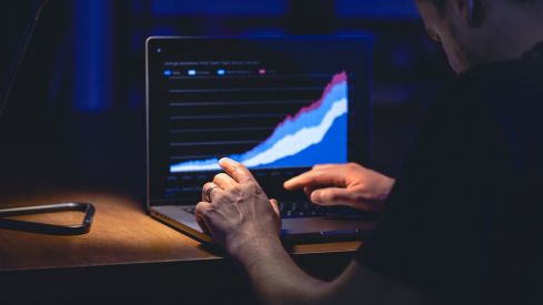 man trading browsing online stock investments night 2 2