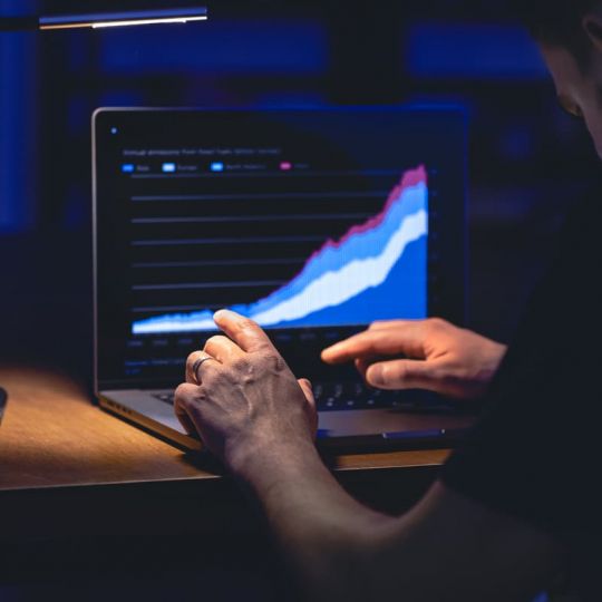 man trading browsing online stock investments night 2 2